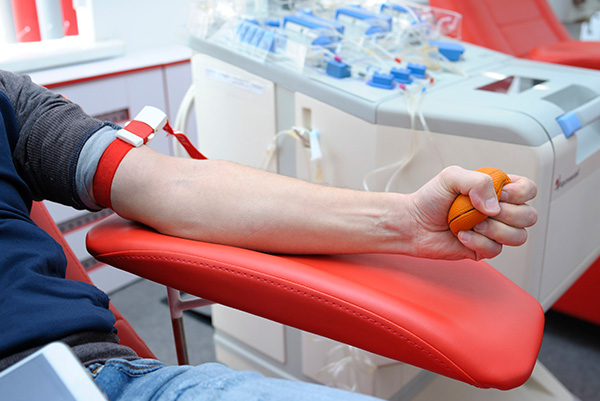 Individual donating blood.